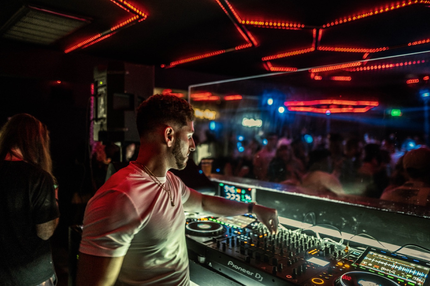 Jordan Miller behind Pioneer decks at The Cut in Austin during SXSW Weekend 2